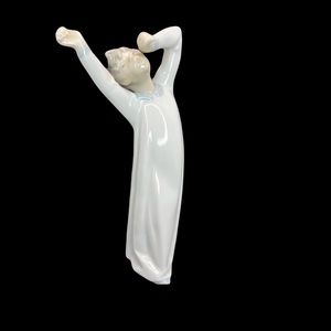 LLADRO BOY IN NIGHT GOWN